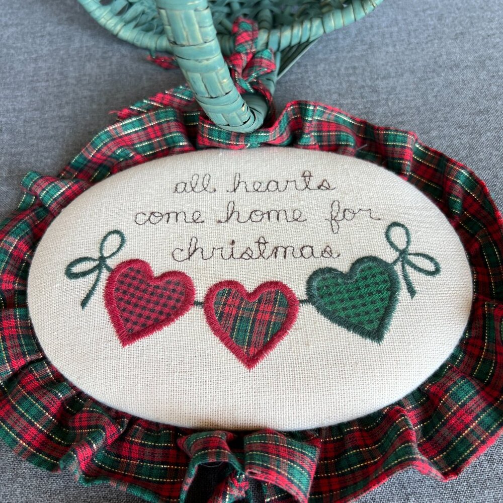 Christmas embroidered top green wicker basket All Hearts Come Home for Christmas
